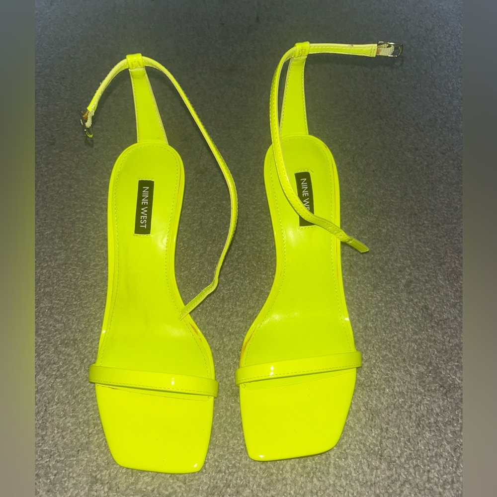 Neon yellow open toe heels.